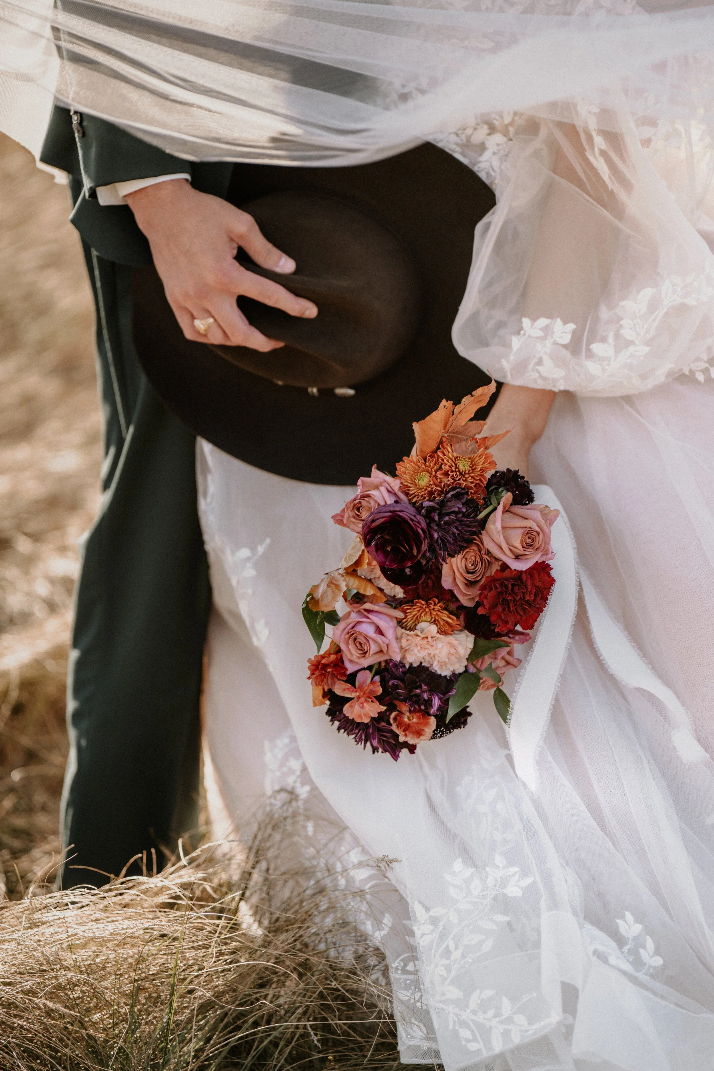 Elopement ceremony beside a glacial lake in Glacier National Park
