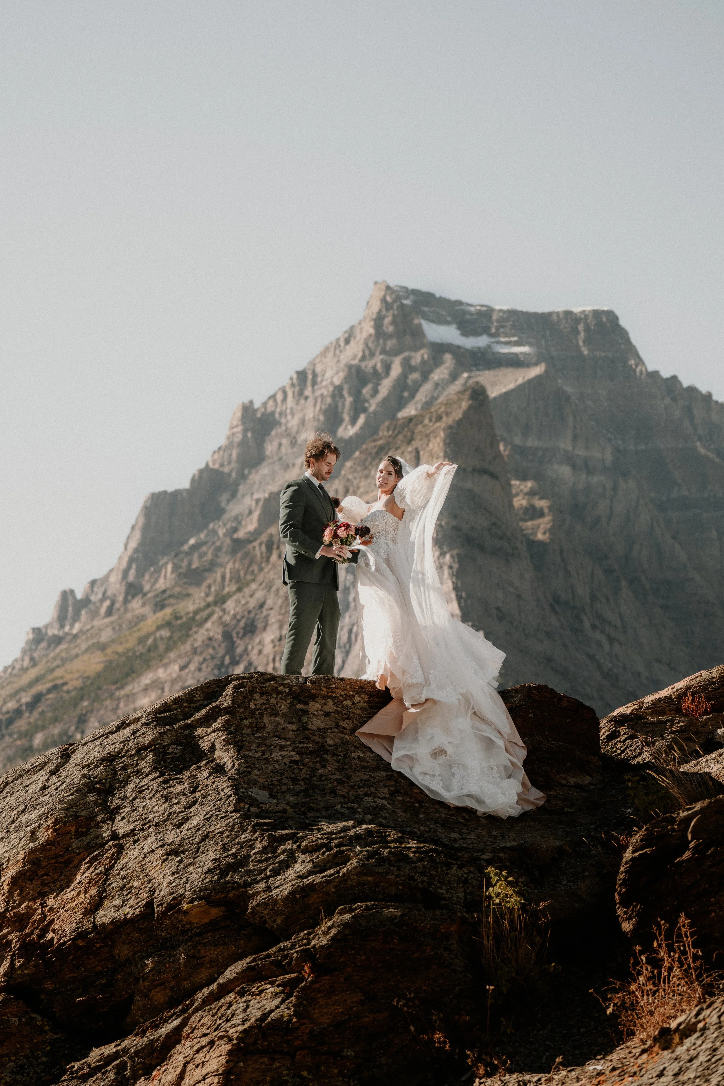 Glacier National Park elopement couple at sunrise
