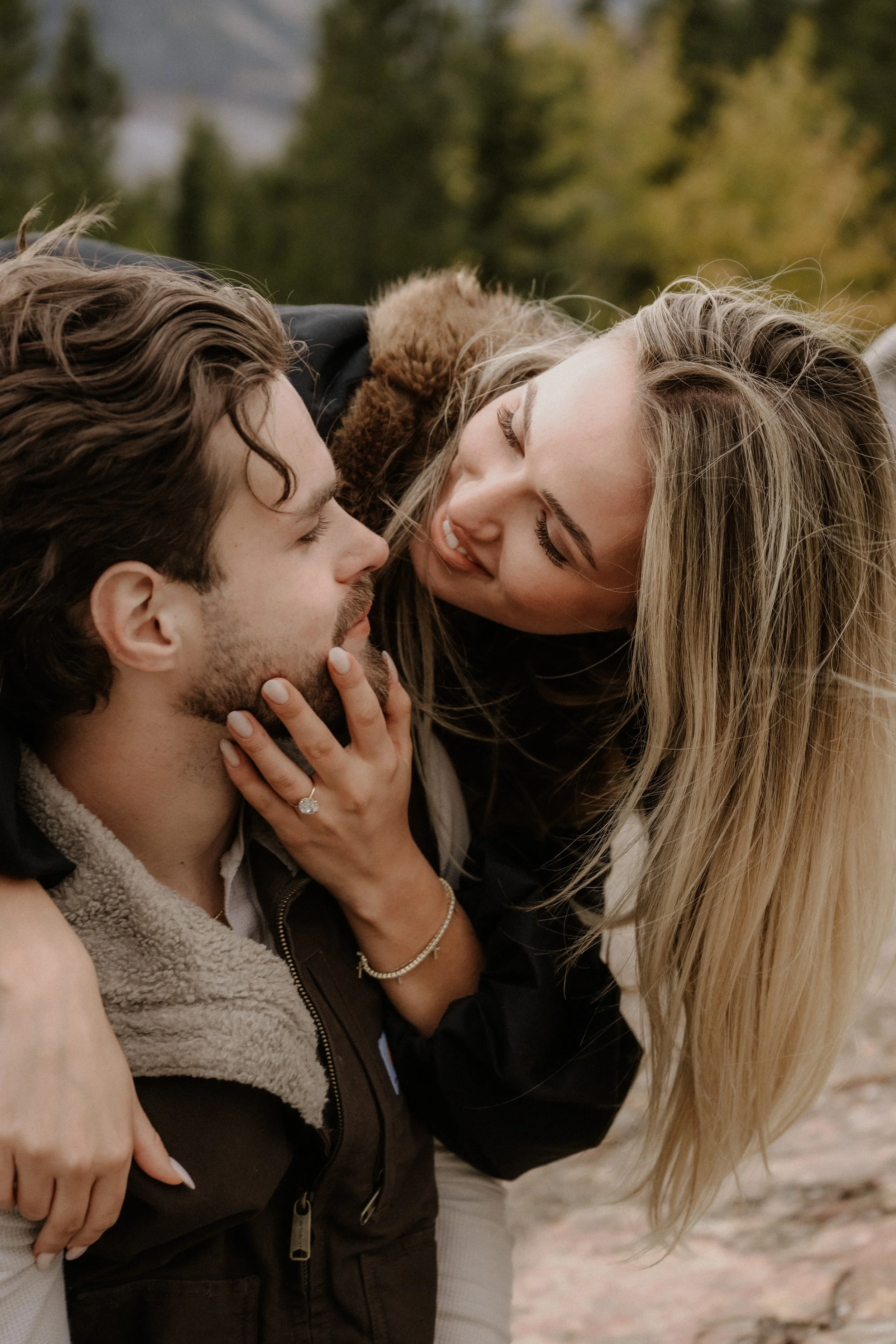Rowan and Matt engaged at Sun Point in Glacier National Park