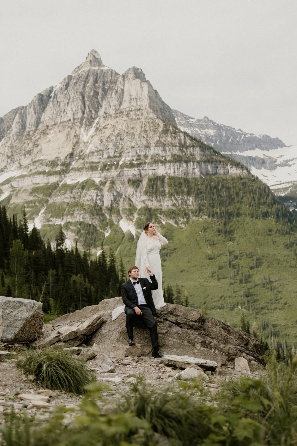 Maddie holding her bouquet during her Glacier National Park elopement