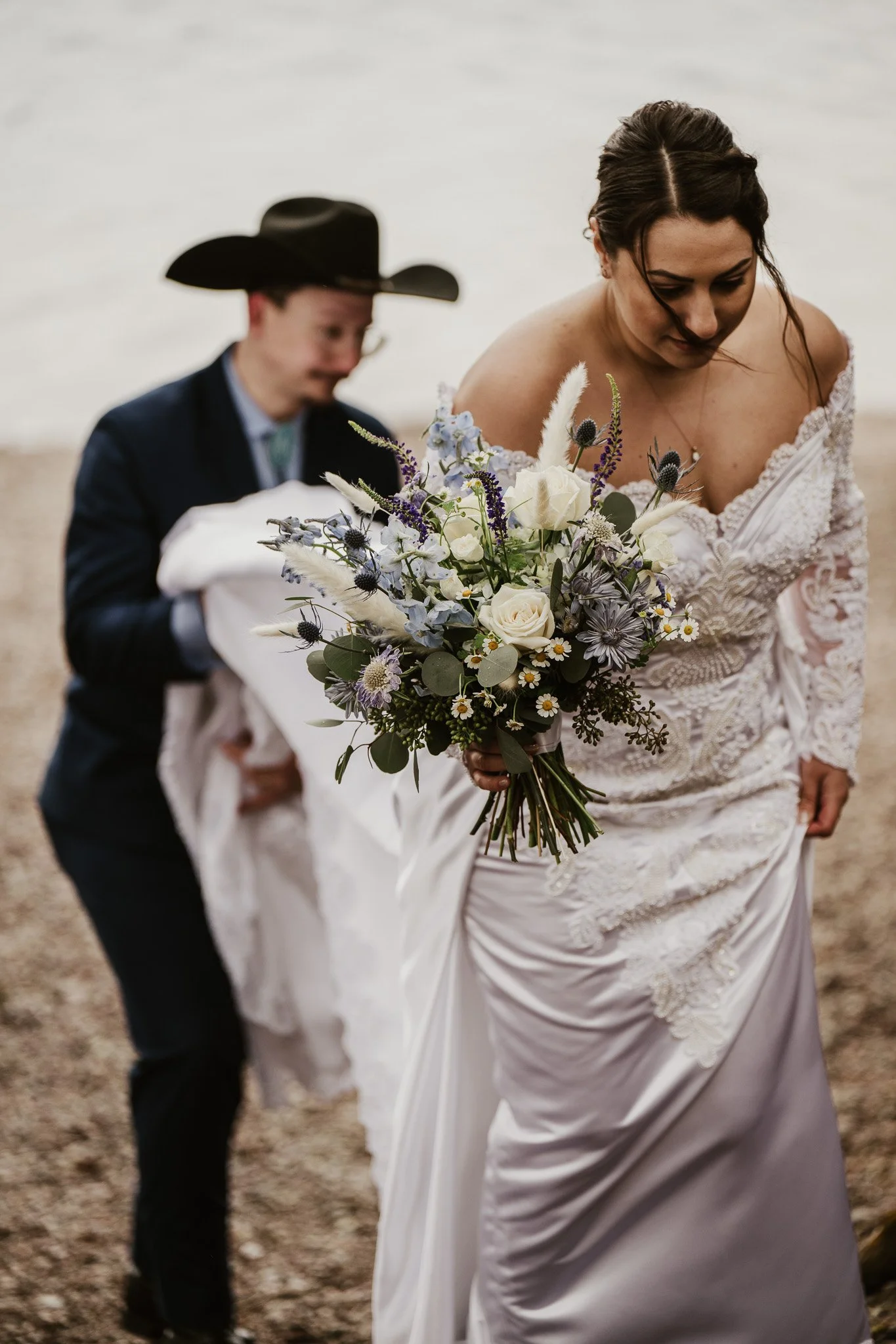 Ian and Rachel exchanging rings at the 7-Mile Pullout ceremony, Glacier National Park