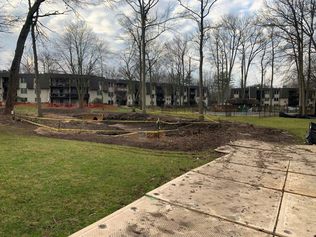 Machine grading establishing proper slopes