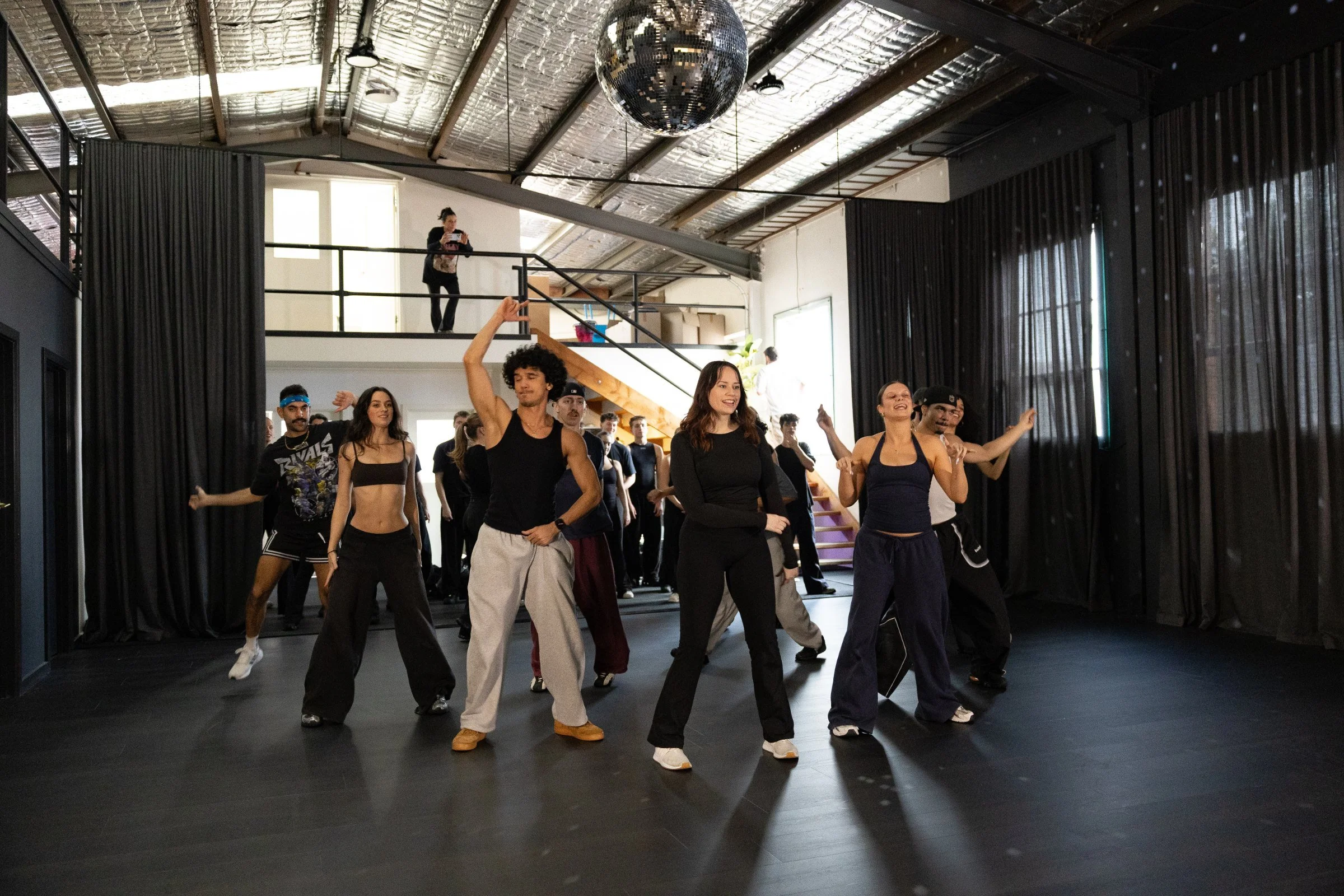 The MSE HQ studio in Richmond, with the mezzanine above and a cast in rehearsal