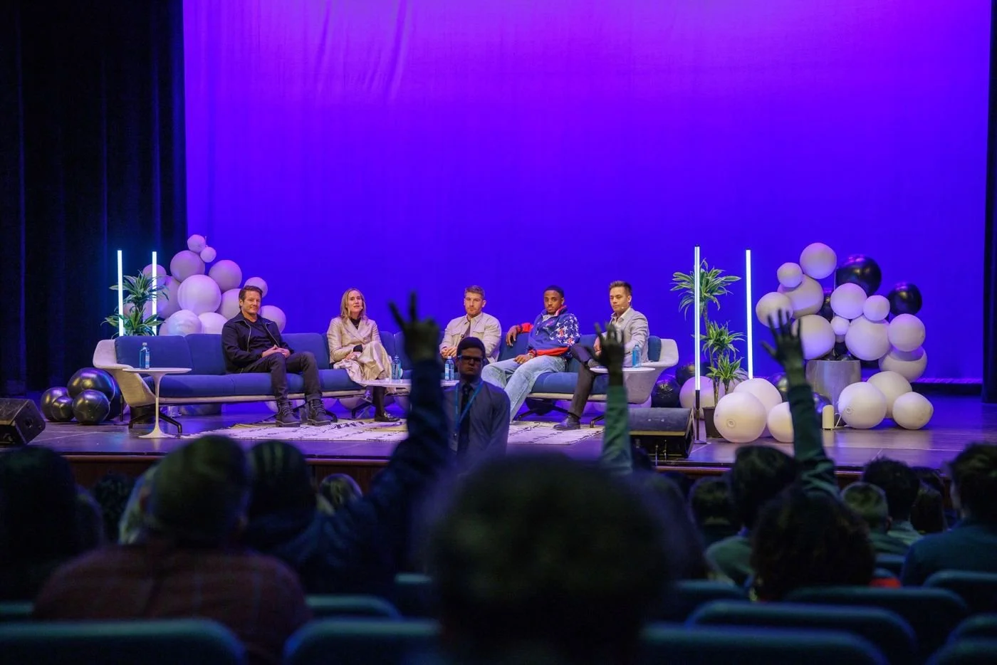 Audience members raising hands during Q&A at the 2026 Starting Small Summit