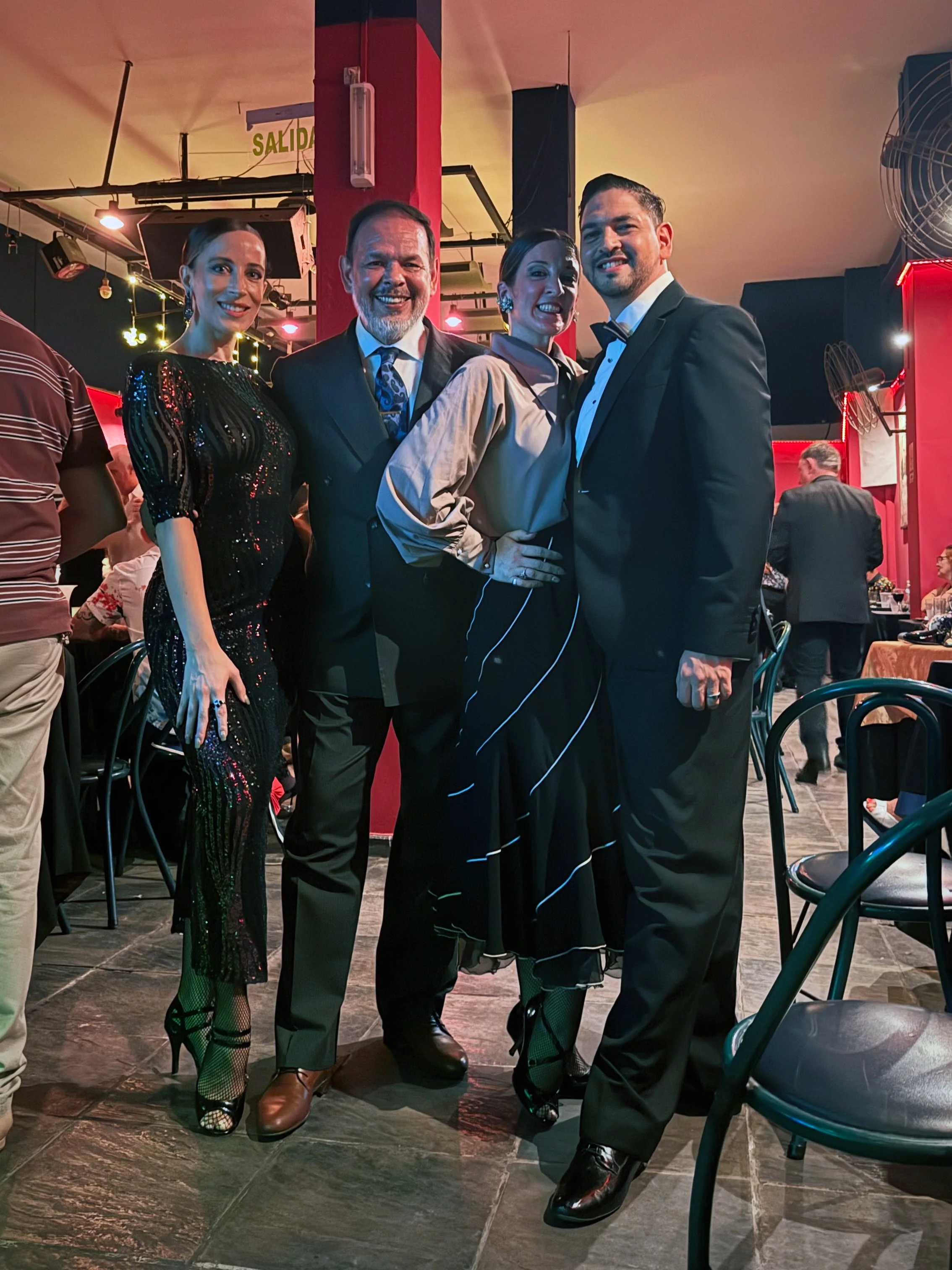 Letitia and Andrés at the famous Porteño y Bailarín milonga in Buenos Aires with well-known maestros