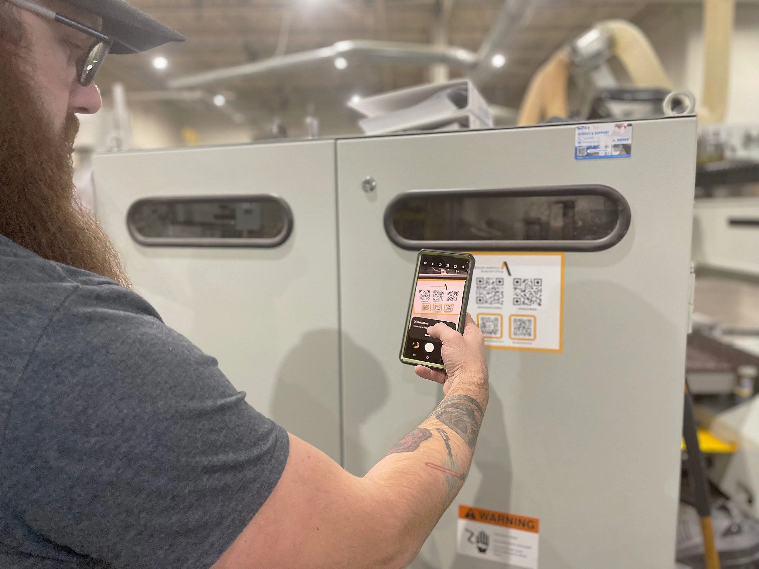 QR code mounted on Anderson America CNC machine