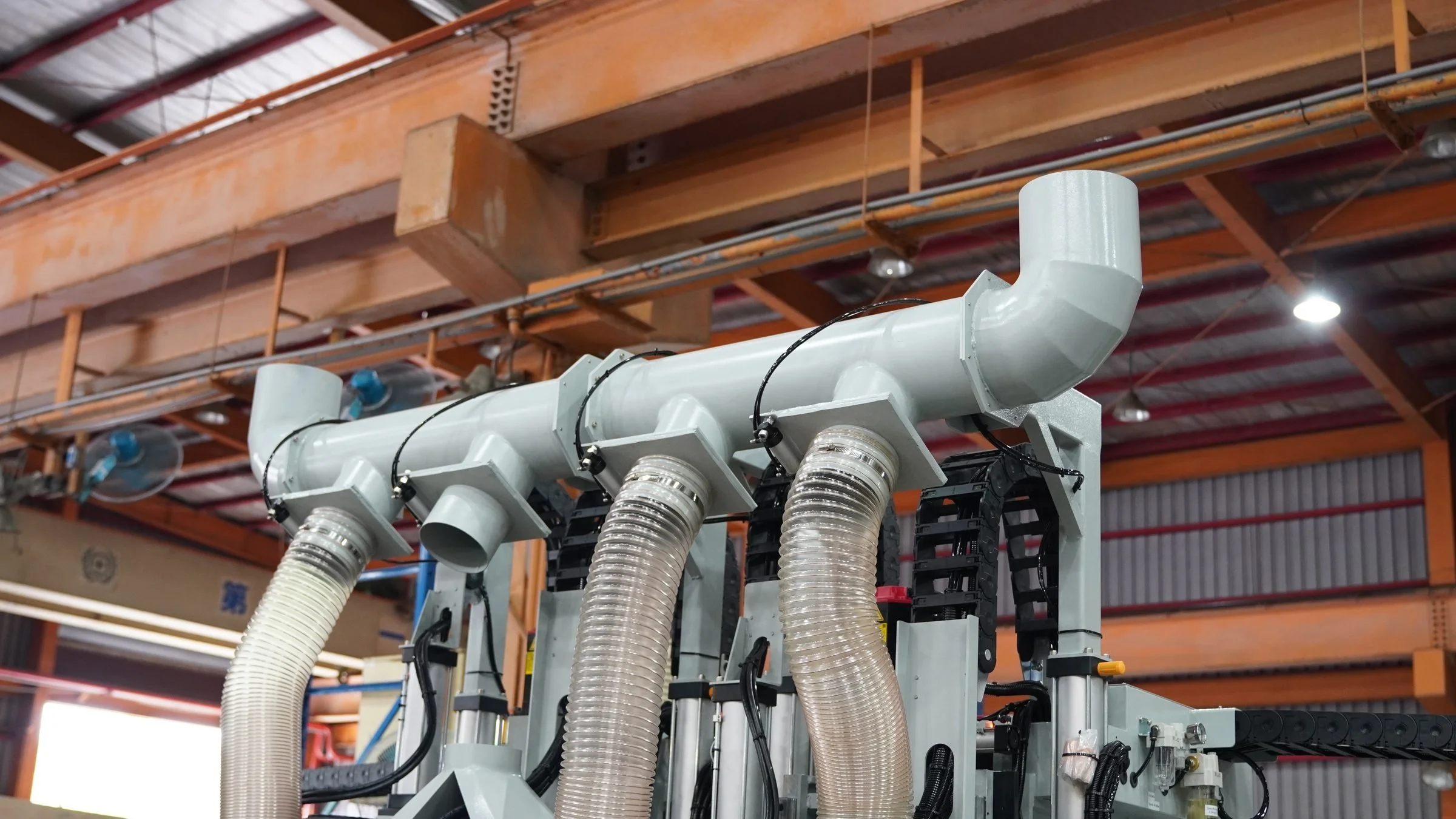 Anderson EXXACT PRO DUO dust collection manifold on the production floor