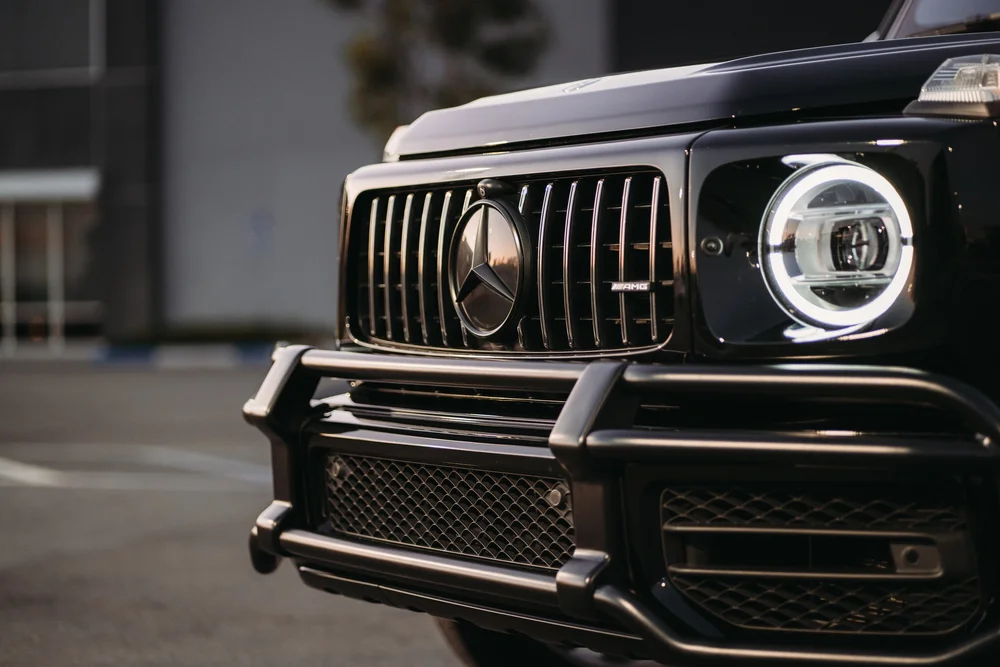 Mercedes-AMG G 63, wide close view of grille, headlight and front bumper