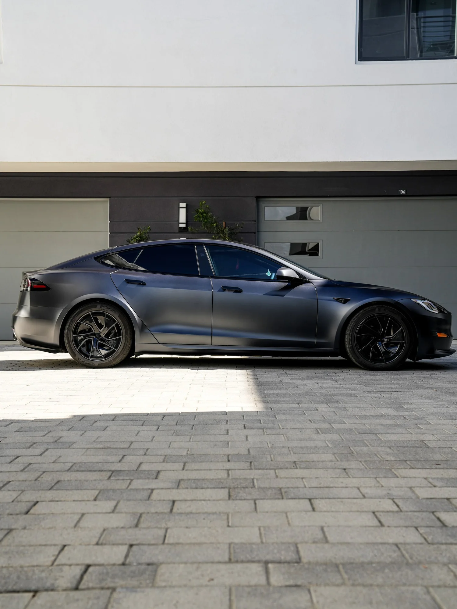 Tesla Model S after Matte PPF and Window Tint, rear-right three-quarter view
