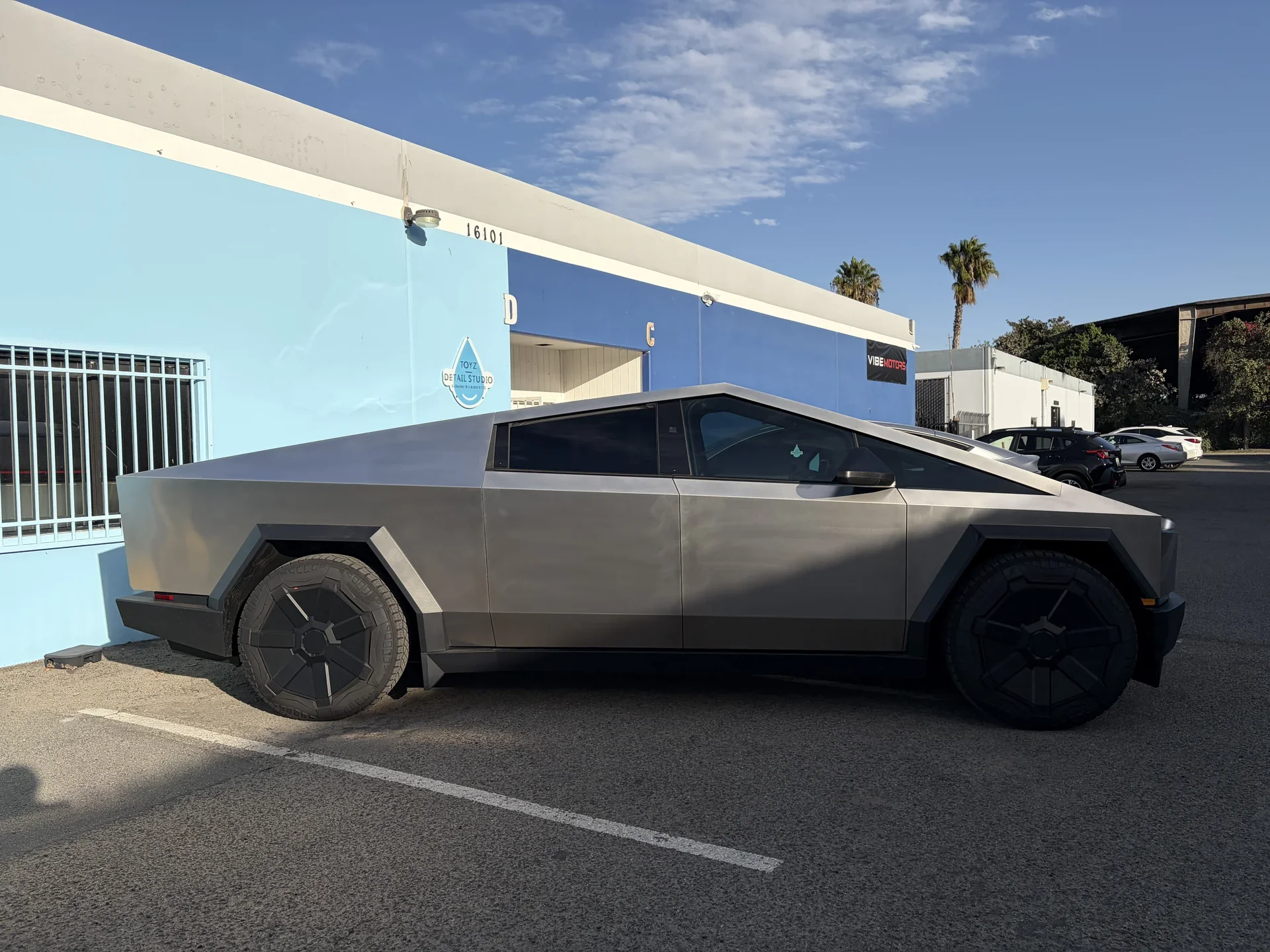 2026 Tesla Cybertruck Cyberbeast — side view parked outside the studio