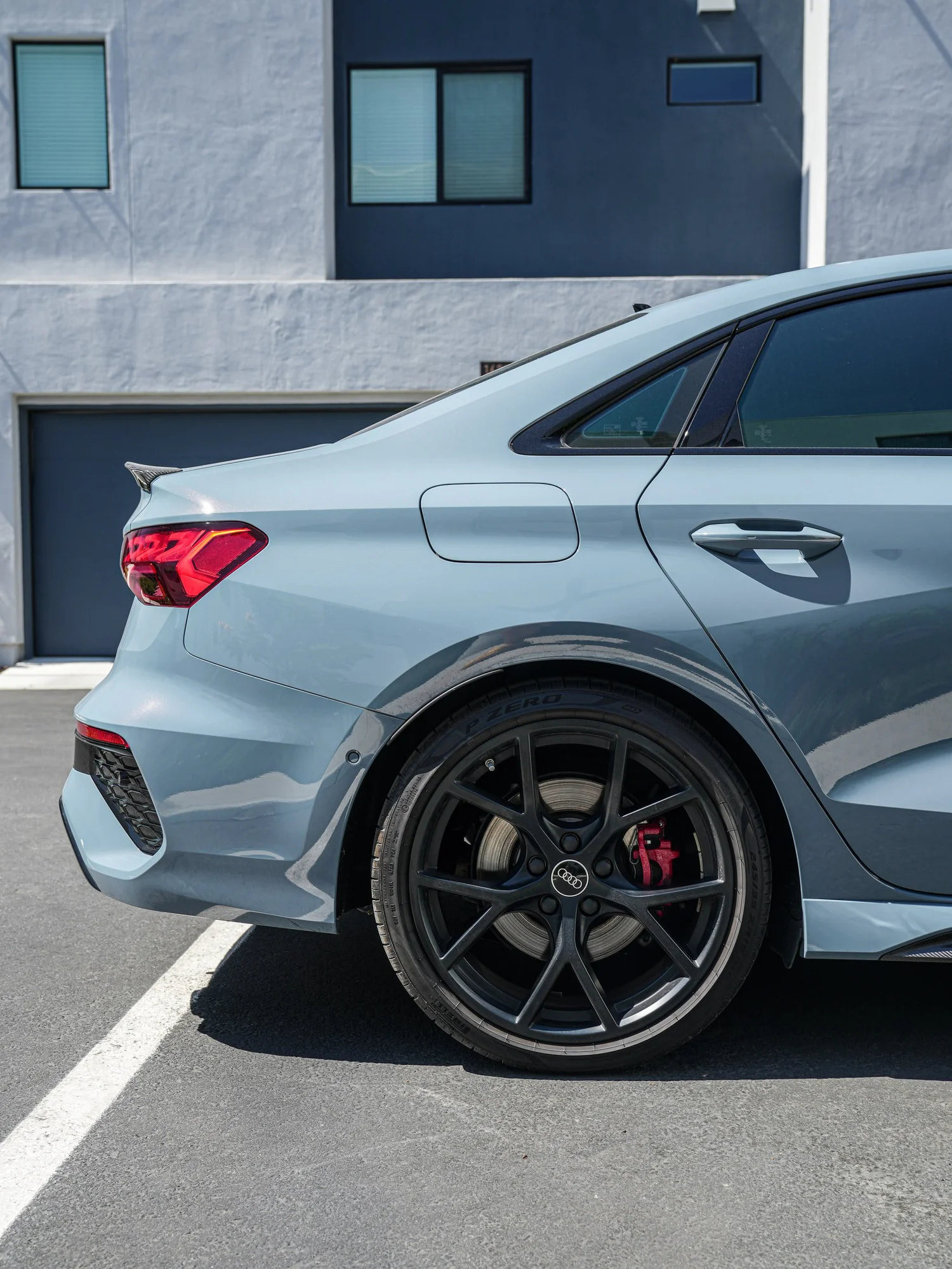 Audi RS 3 XR Plus after Window Tint and Ceramic Coating, rear-quarter and wheel view