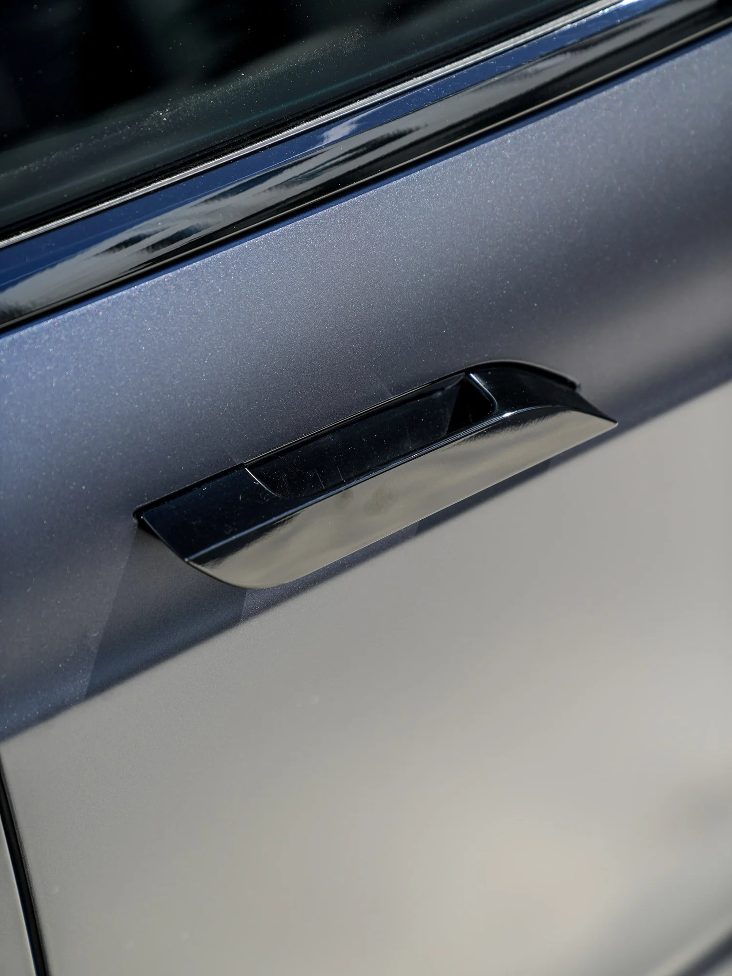 Tesla Model S after Matte PPF and Window Tint, door-jamb and trim detail