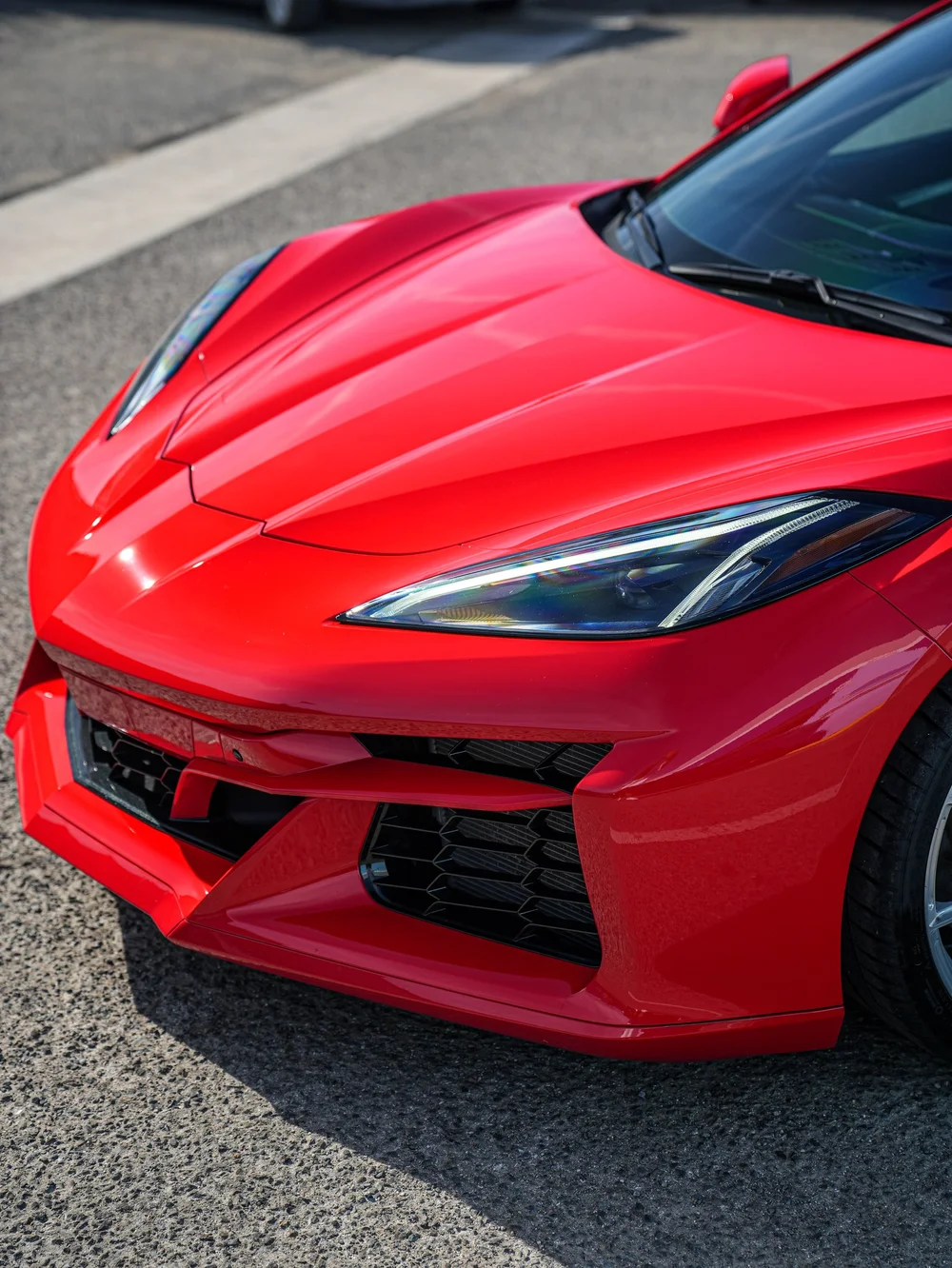 Angled hood, headlight and front bumper close view — Chevrolet Corvette Z06 paint protection film project