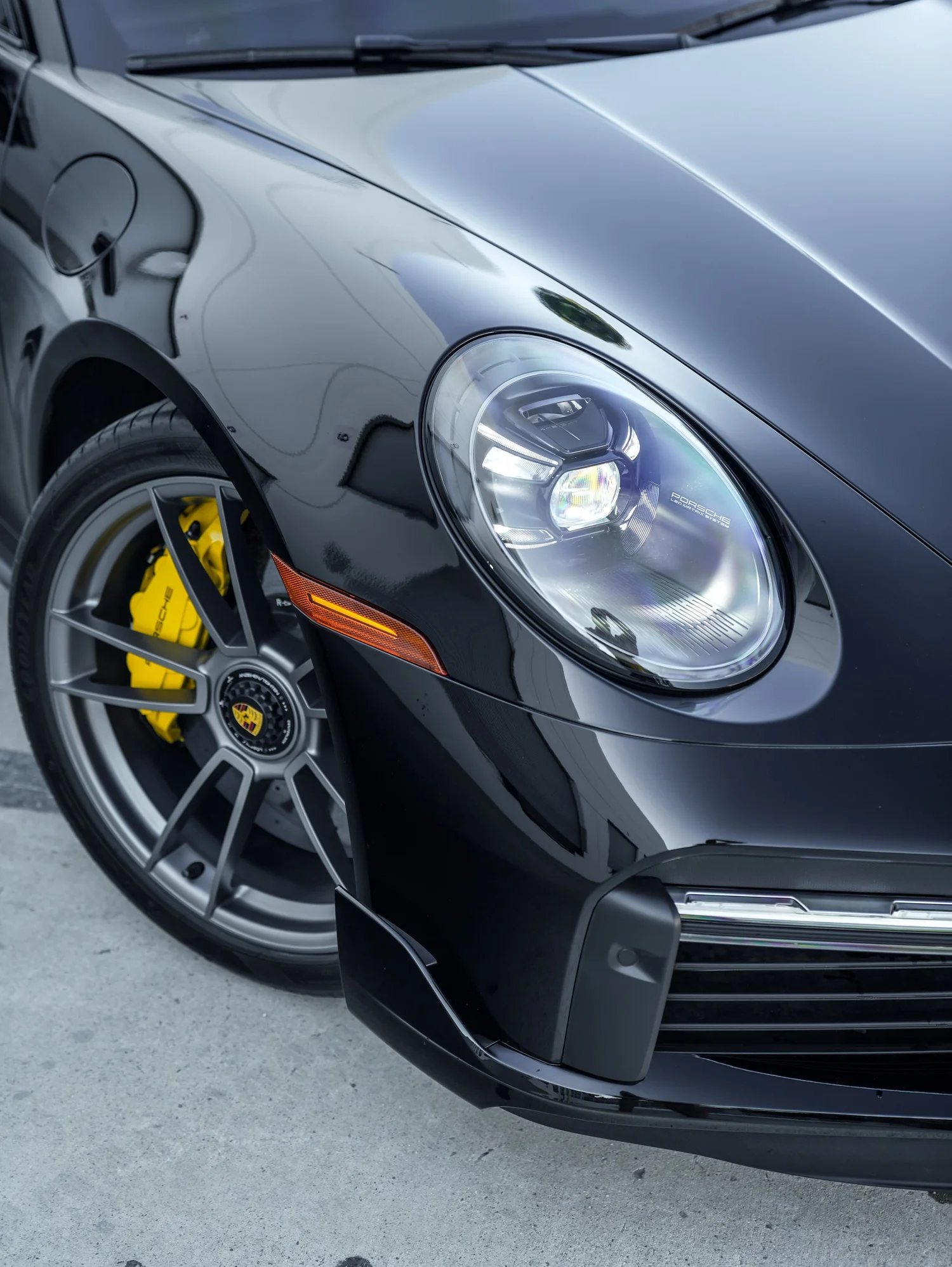 Porsche 911 Turbo S after Paint Protection Film (PPF), Window Tint and Ceramic Coating, front-fender and wheel view