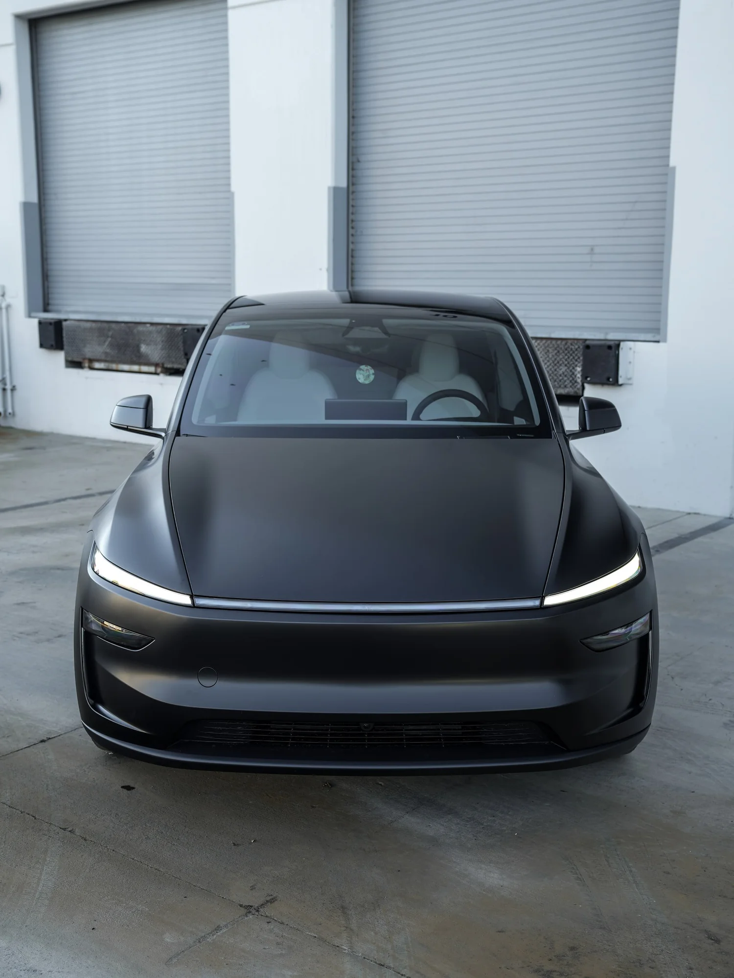 Tesla Model Y 3M Satin Black after Vinyl Wrap, direct front view