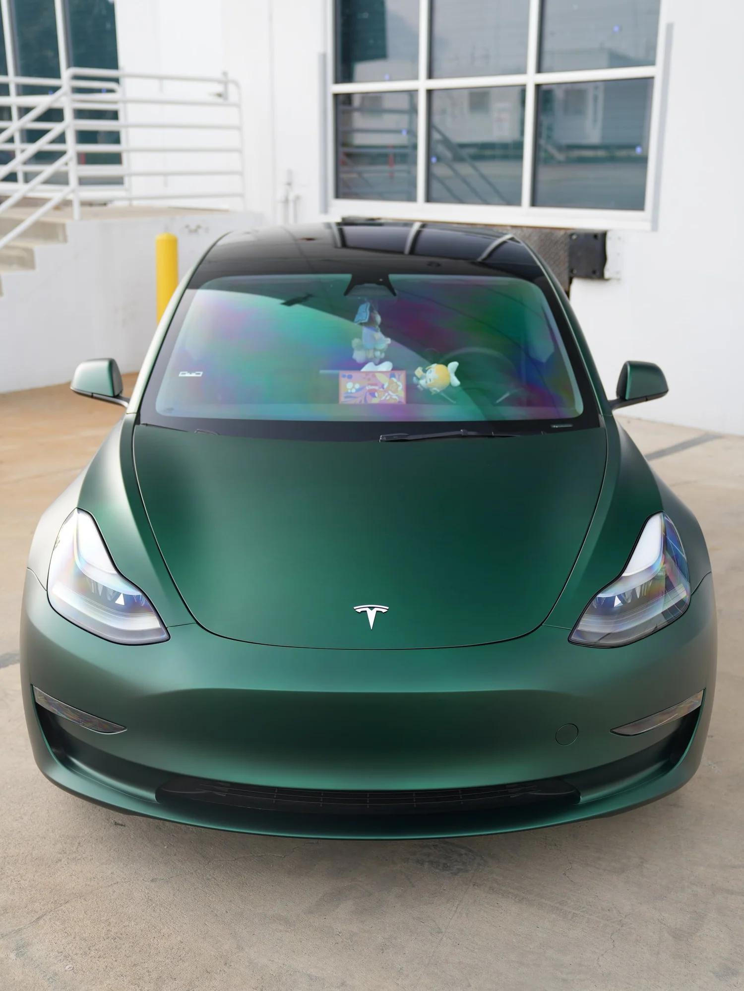 Tesla Model 3 Ghost Matte Green after Vinyl Wrap, direct front view