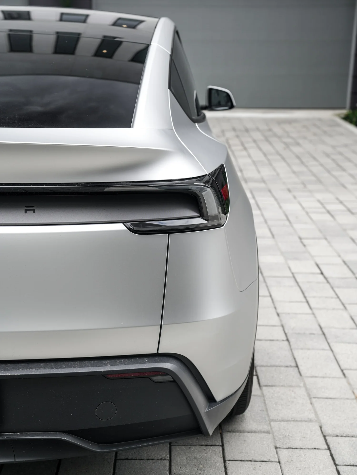 Tesla Model Y TPU Matte Silver Colored PPF after Paint Protection Film (PPF), rear body and taillight view