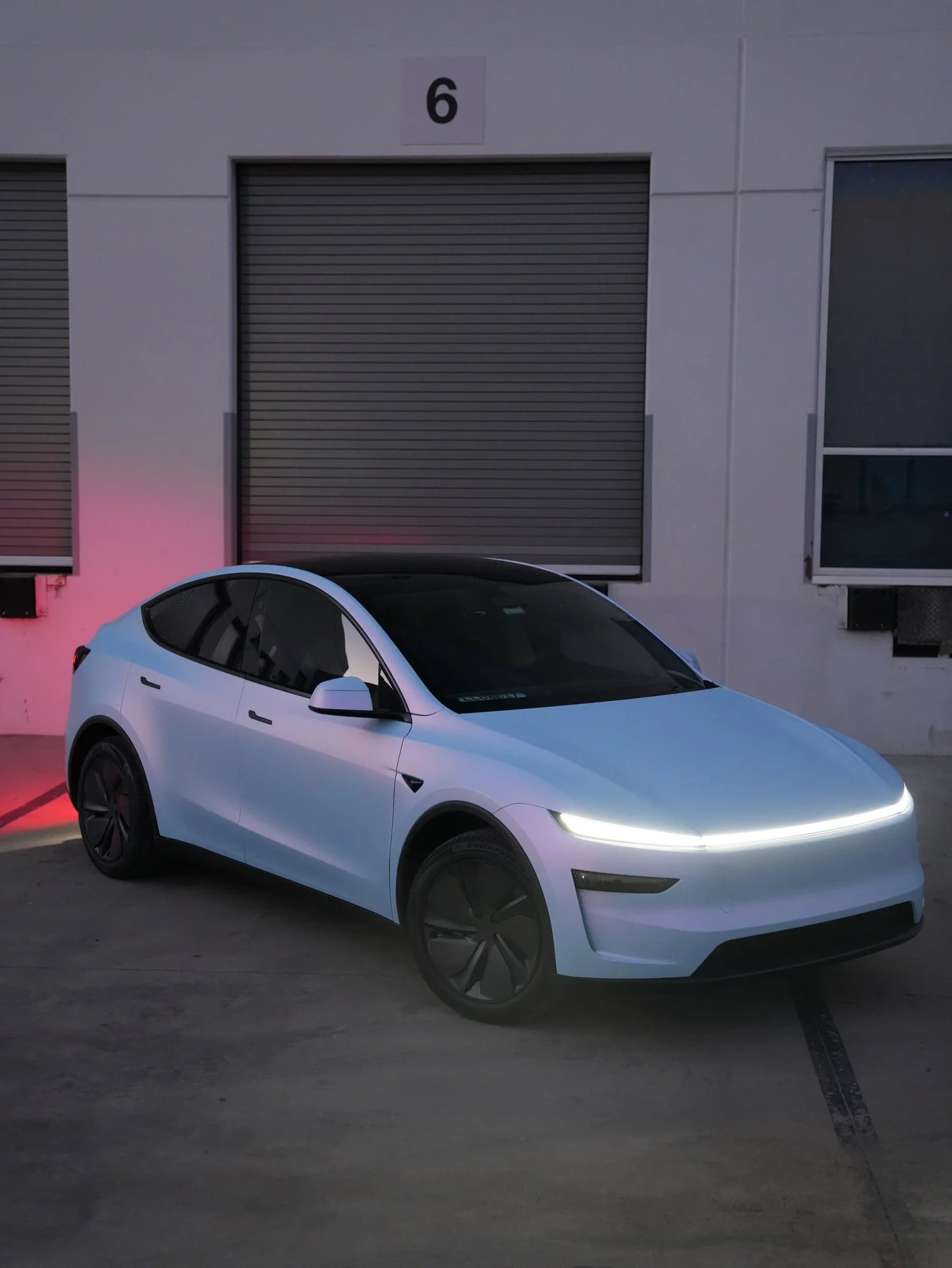 Tesla Model Y Color-Shifting White-to-Blue after Vinyl Wrap, left-side profile