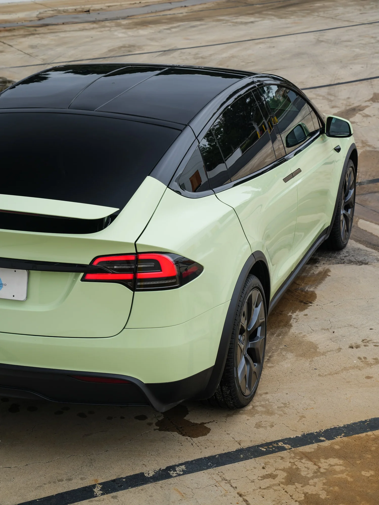 Tesla Model X Avocado Green after Vinyl Wrap, rear-right three-quarter view