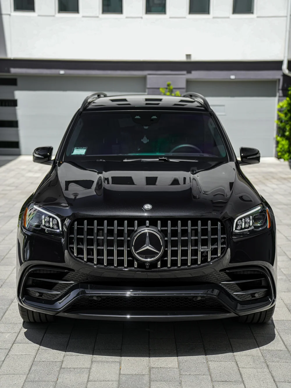 Direct front view of the Mercedes-AMG GLS 63 showing the grille after PPF and XR Plus tint