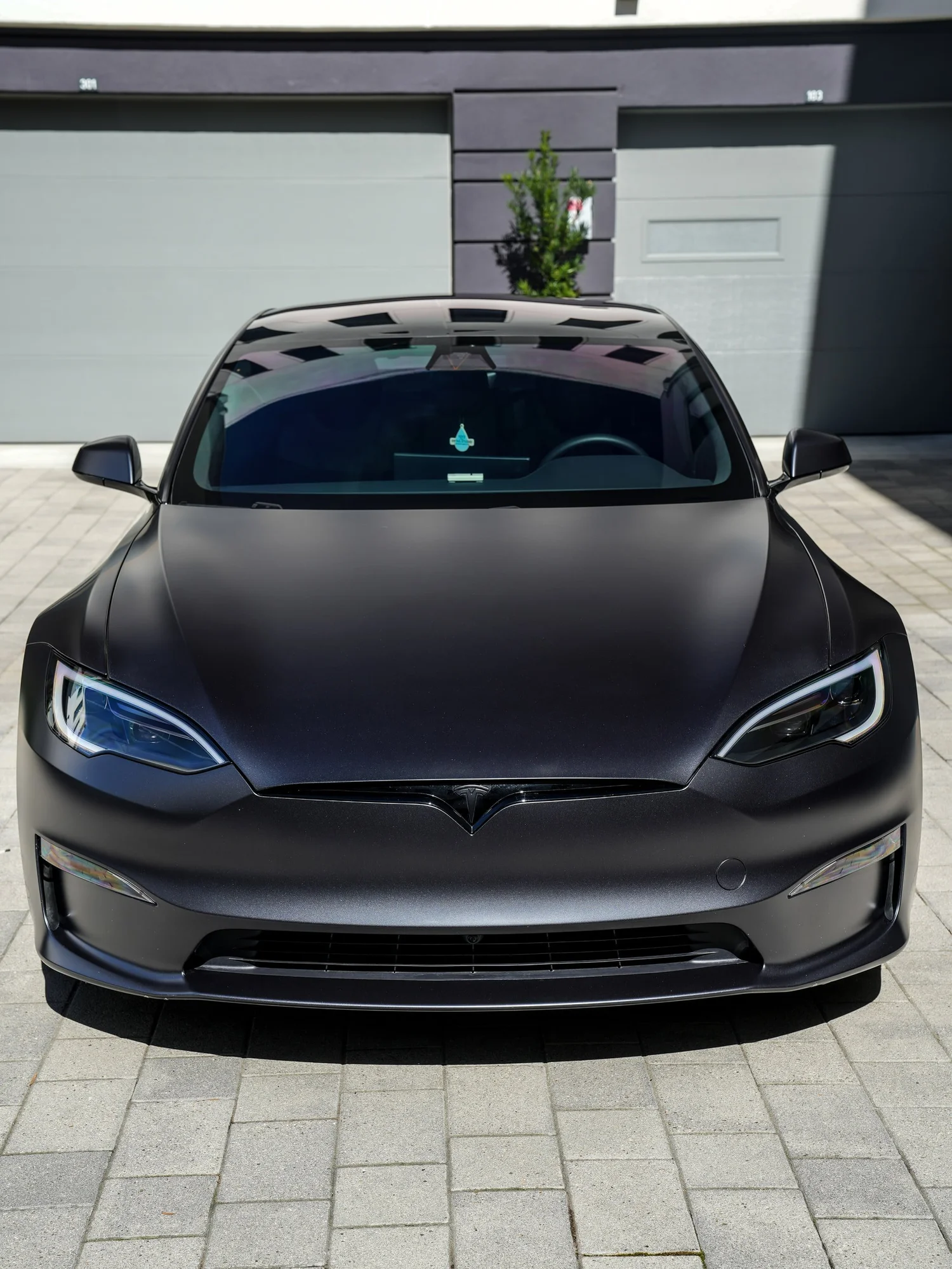 Tesla Model S after Matte PPF and Window Tint, low-angle front view