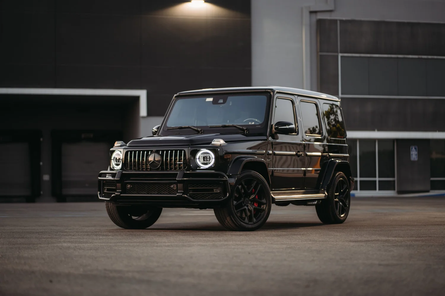 Mercedes-AMG G 63 after Paint Protection Film (PPF), Ceramic Coating, Chrome Delete and Wheel Powder Coating, front-left three-quarter view