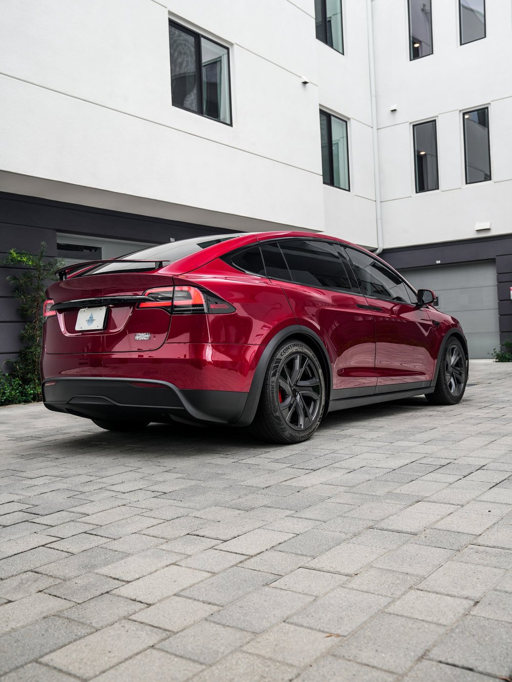 Tesla Model X PPF and XR Plus tint project, rear three-quarter view showing the complete Model X