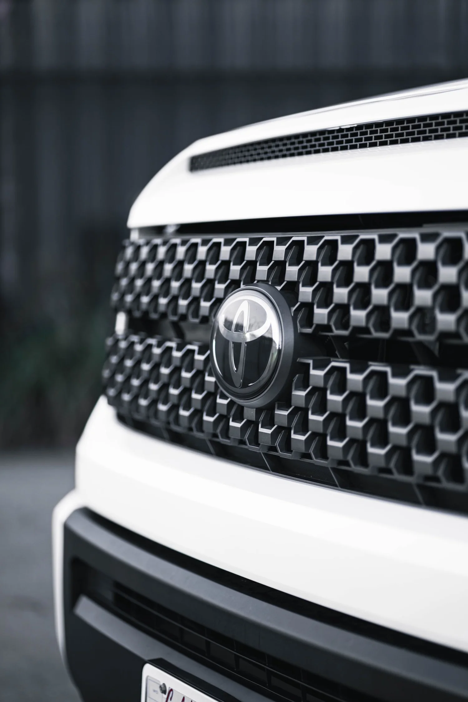 Toyota Tundra 3M 2080 Gloss White after Vinyl Wrap, front grille detail