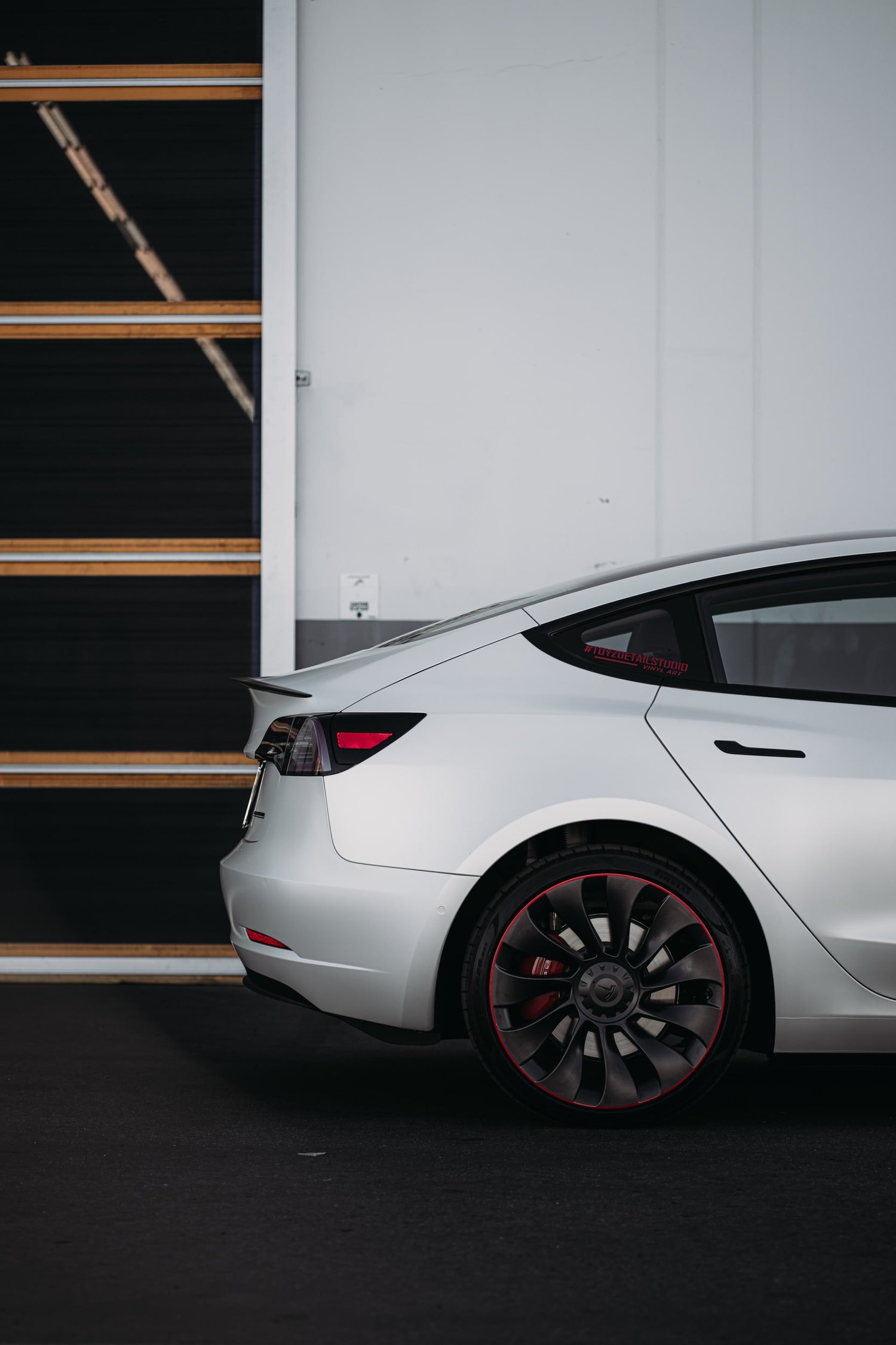 Tesla Model 3 3M 2080 Satin Pearl White after Vinyl Wrap, rear-quarter and wheel view