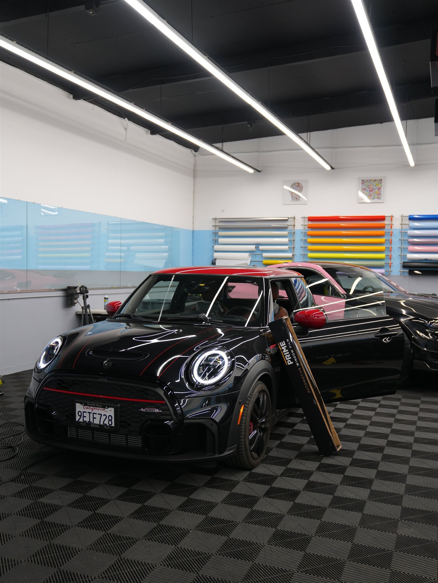 MINI Cooper with XPEL PRIME window film inside Toyz Detail Studio in Irvine.