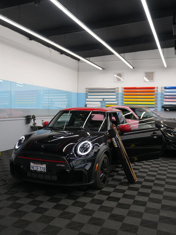 MINI Cooper with XPEL PRIME window film inside Toyz Detail Studio in Irvine