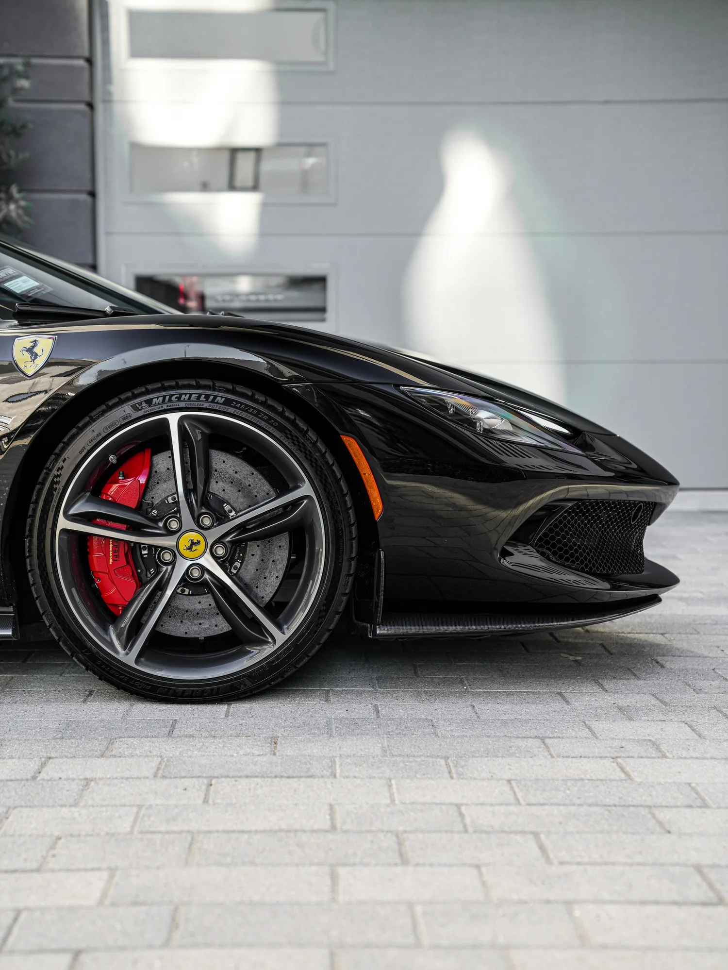 Ferrari 296 after Paint Protection Film (PPF) and Window Tint, front wheel and body view