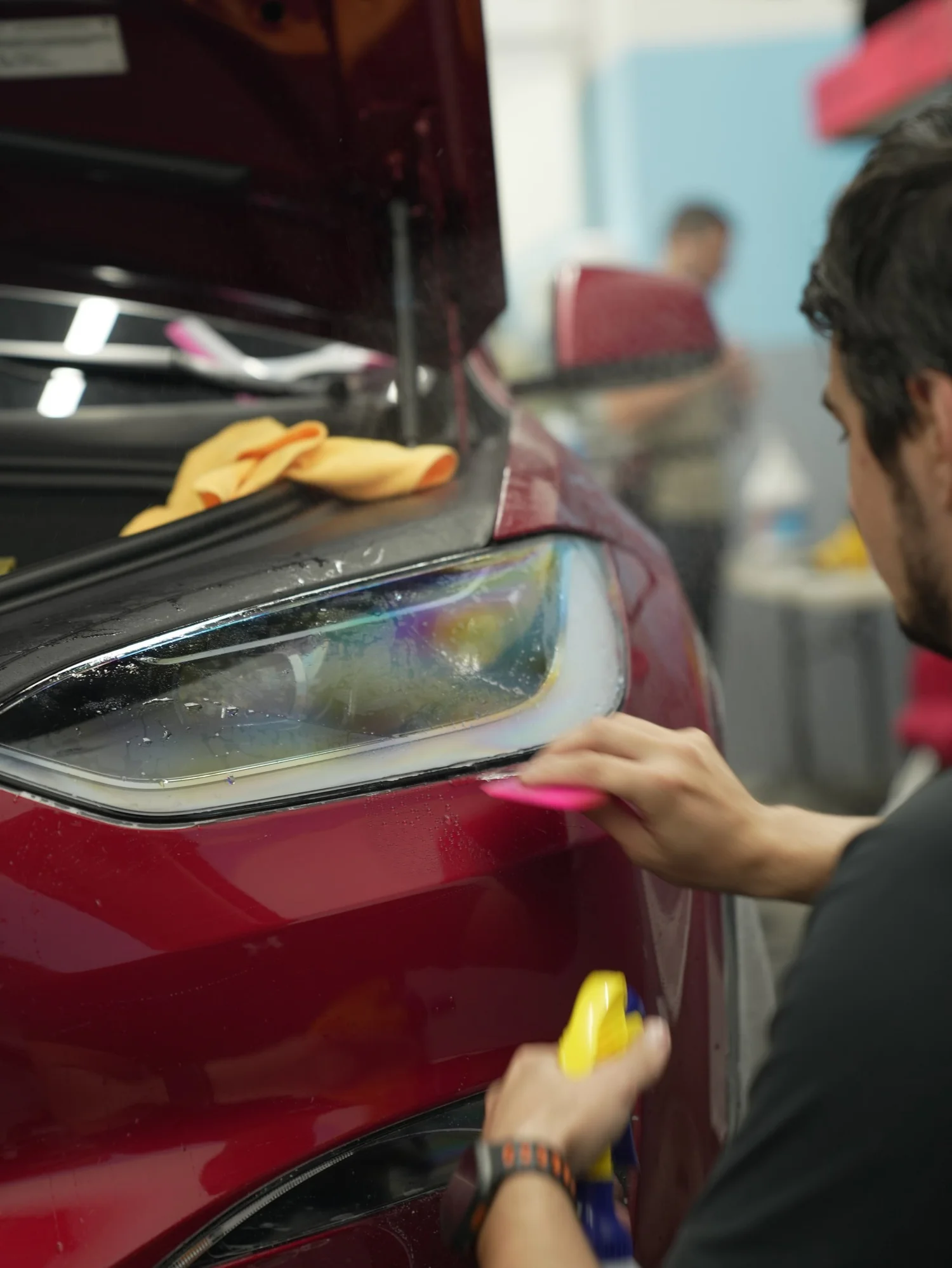 Tesla Model X after Paint Protection Film (PPF) and Window Tint, paint-reflection close-up