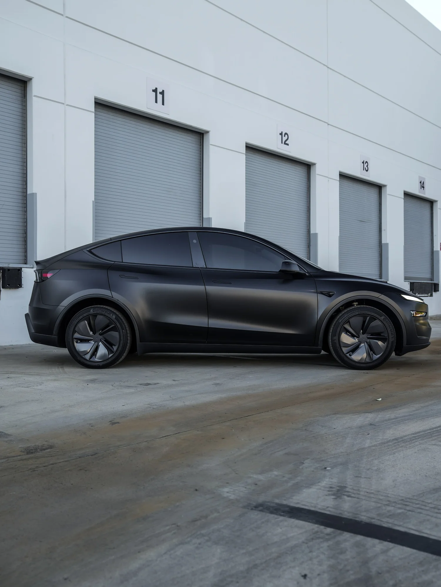 Tesla Model Y 3M Satin Black after Vinyl Wrap, left-side profile