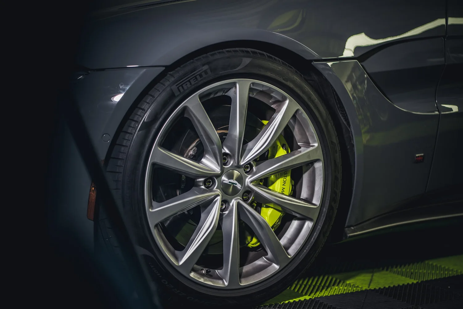 Aston Martin Vantage Acid Green after Brake Caliper Repaint, rear-quarter and wheel view