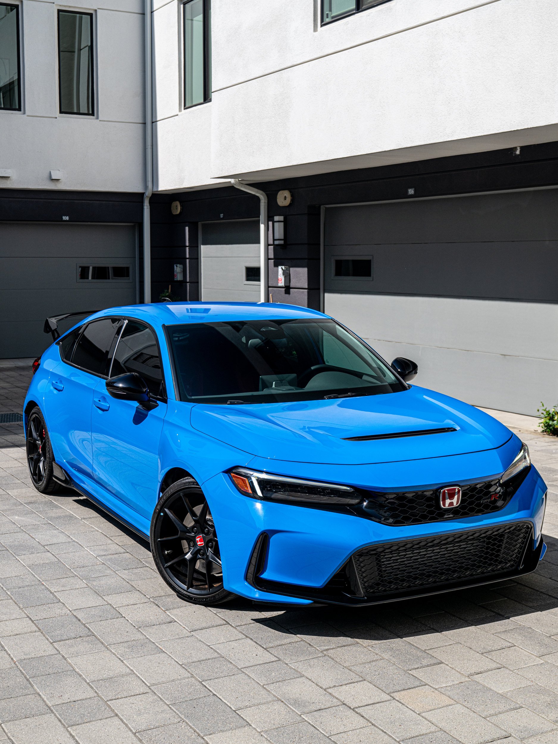 2026 Honda Civic Type R FL5 in Boost Blue Pearl with XPEL ULTIMATE PLUS front protection, front three-quarter view