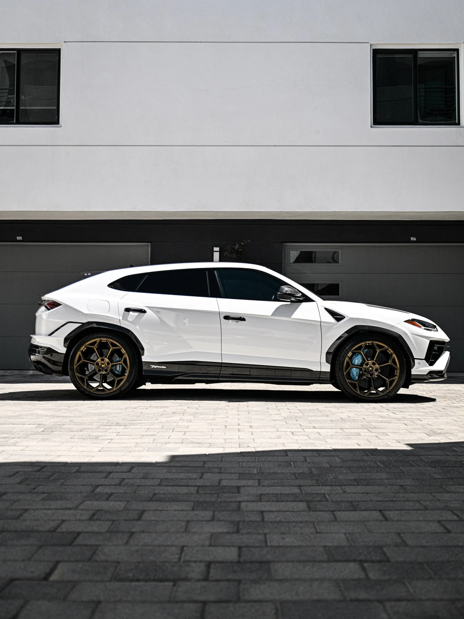 Lamborghini Urus Performante after Paint Protection Film (PPF) and Window Tint, left-side profile