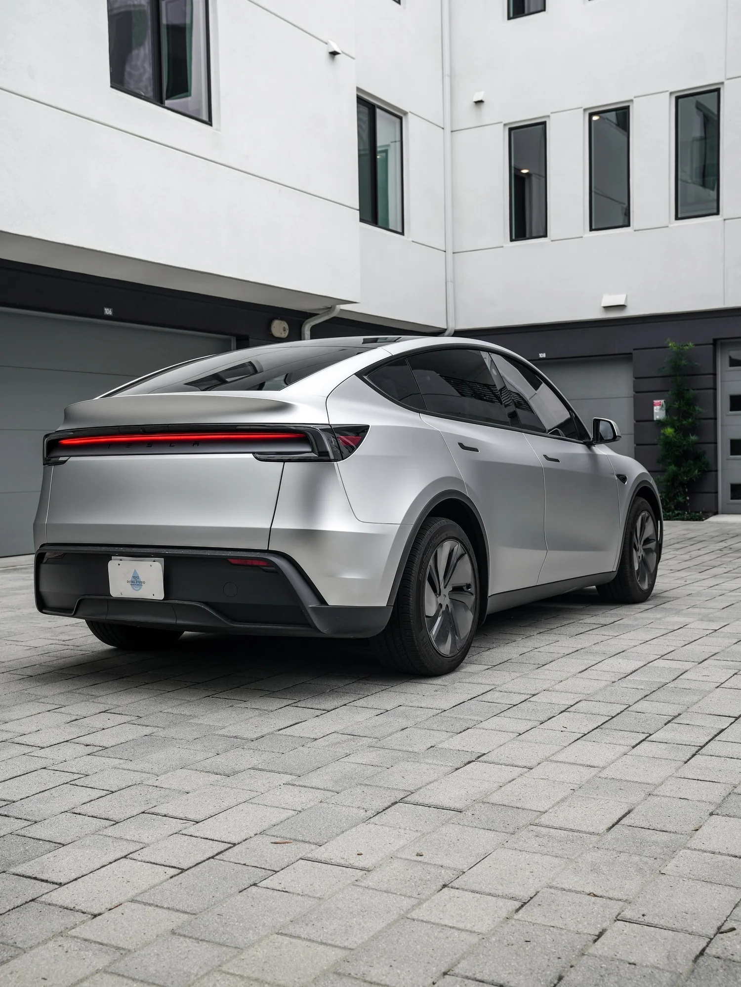 Tesla Model Y TPU Matte Silver Colored PPF after Paint Protection Film (PPF), rear-right three-quarter view