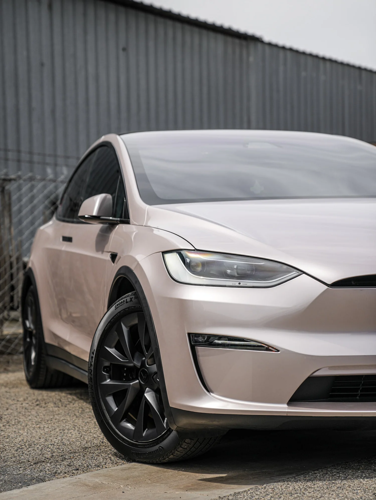 Tesla Model X Champagne Gold after Vinyl Wrap, front-right three-quarter view