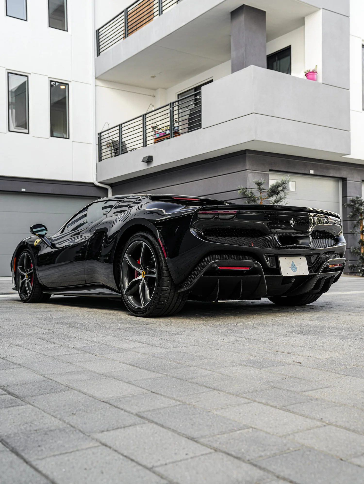 Ferrari 296 after Paint Protection Film (PPF) and Window Tint, rear-left three-quarter view