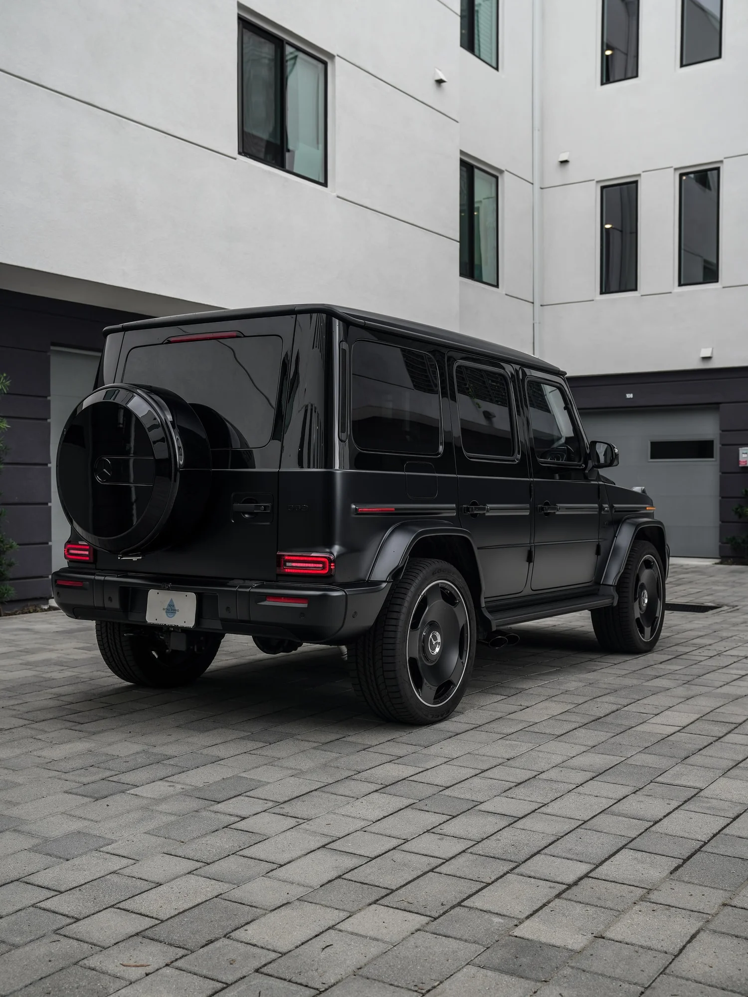 Mercedes-AMG G 63 Two-Tone Black after Paint Protection Film (PPF) and Window Tint, rear-right three-quarter view