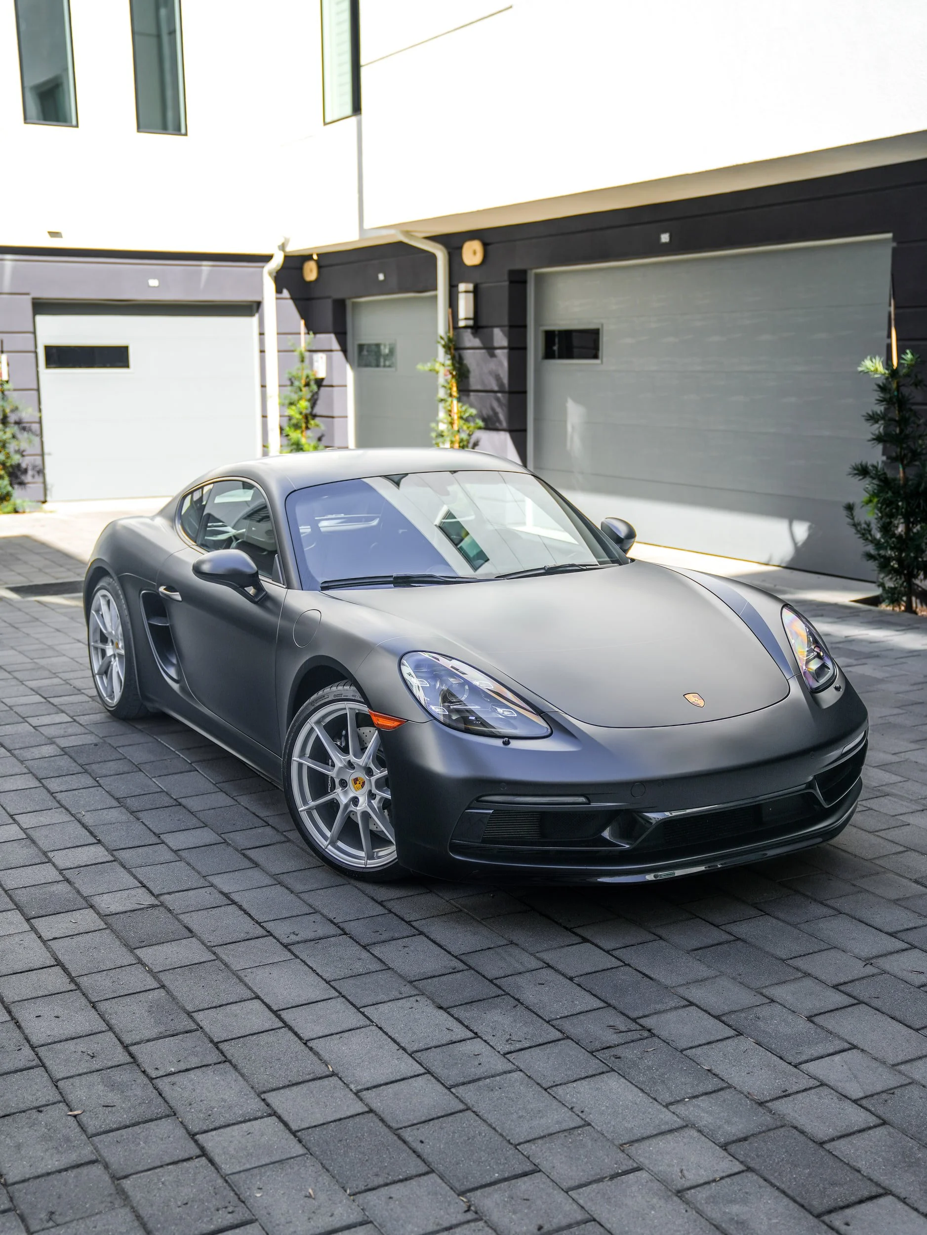 Porsche 718 Cayman GTS 3M Satin Black after vinyl wrap in Irvine