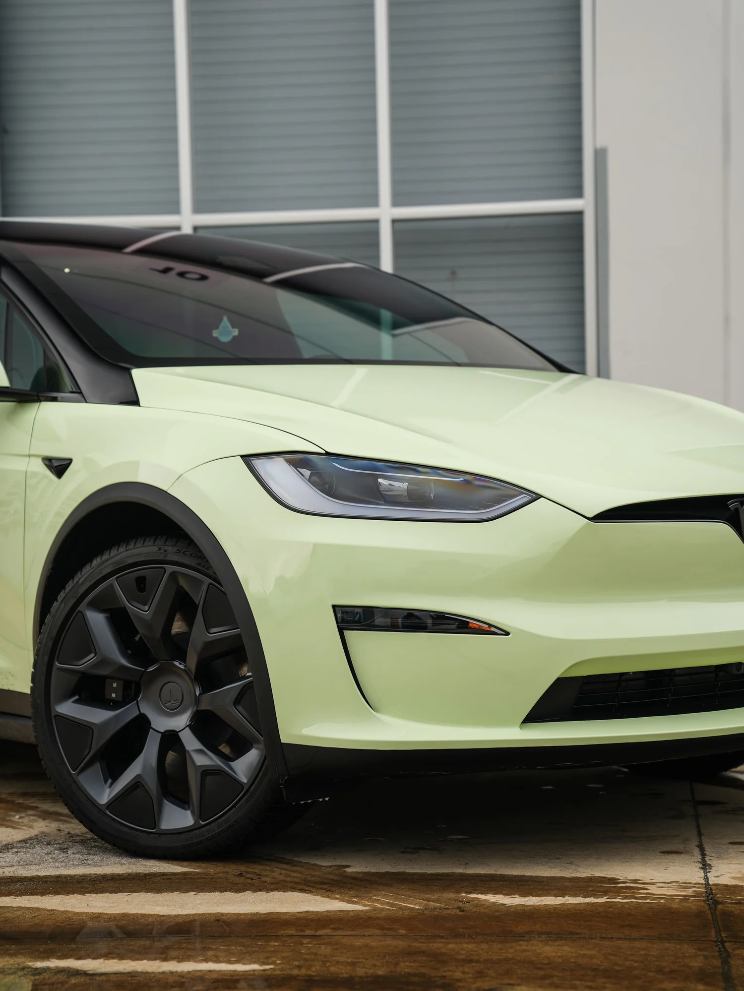 Tesla Model X Avocado Green after Vinyl Wrap, front-right three-quarter view