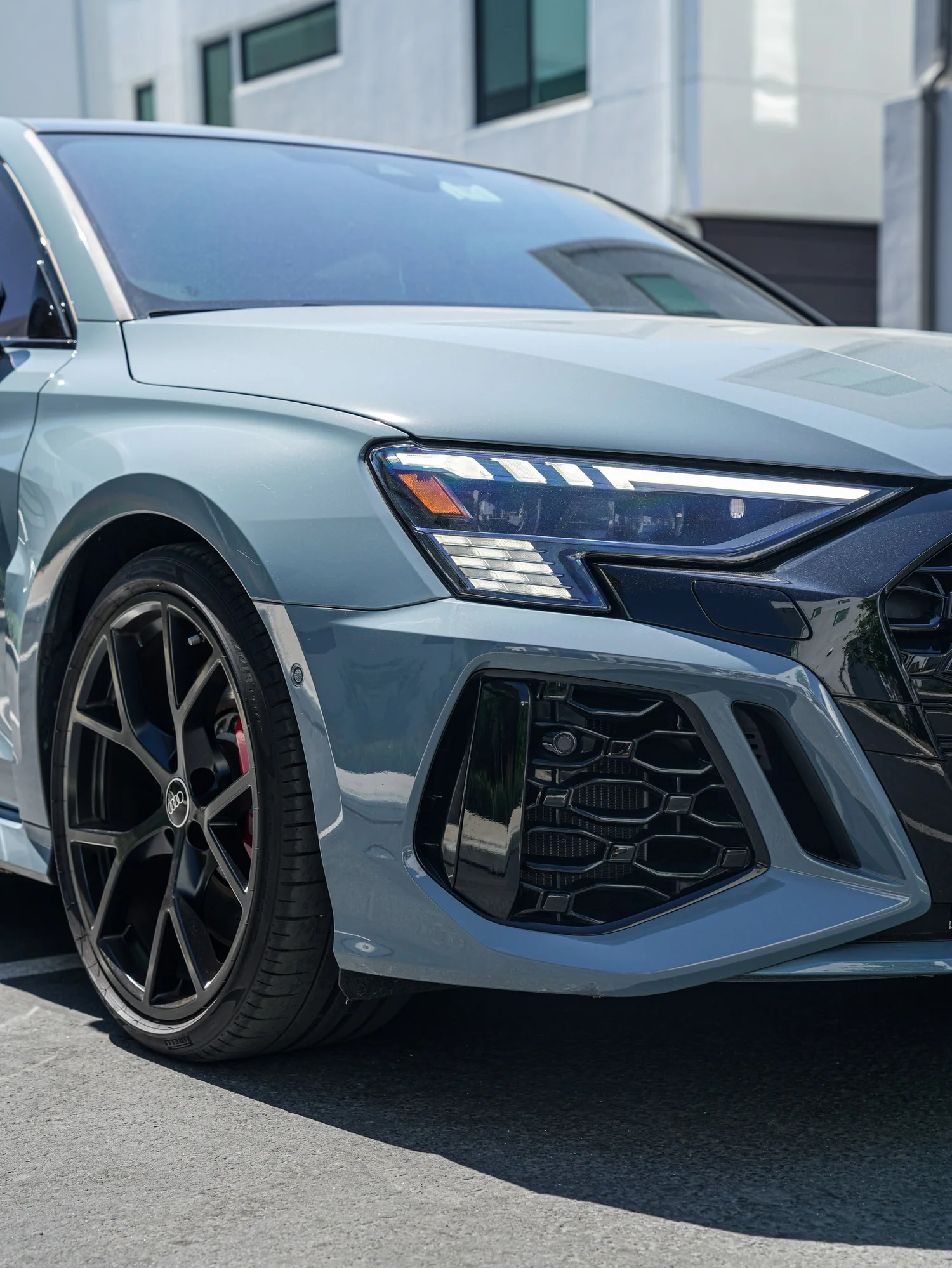 Audi RS 3 XR Plus after Window Tint and Ceramic Coating, front wheel and body view