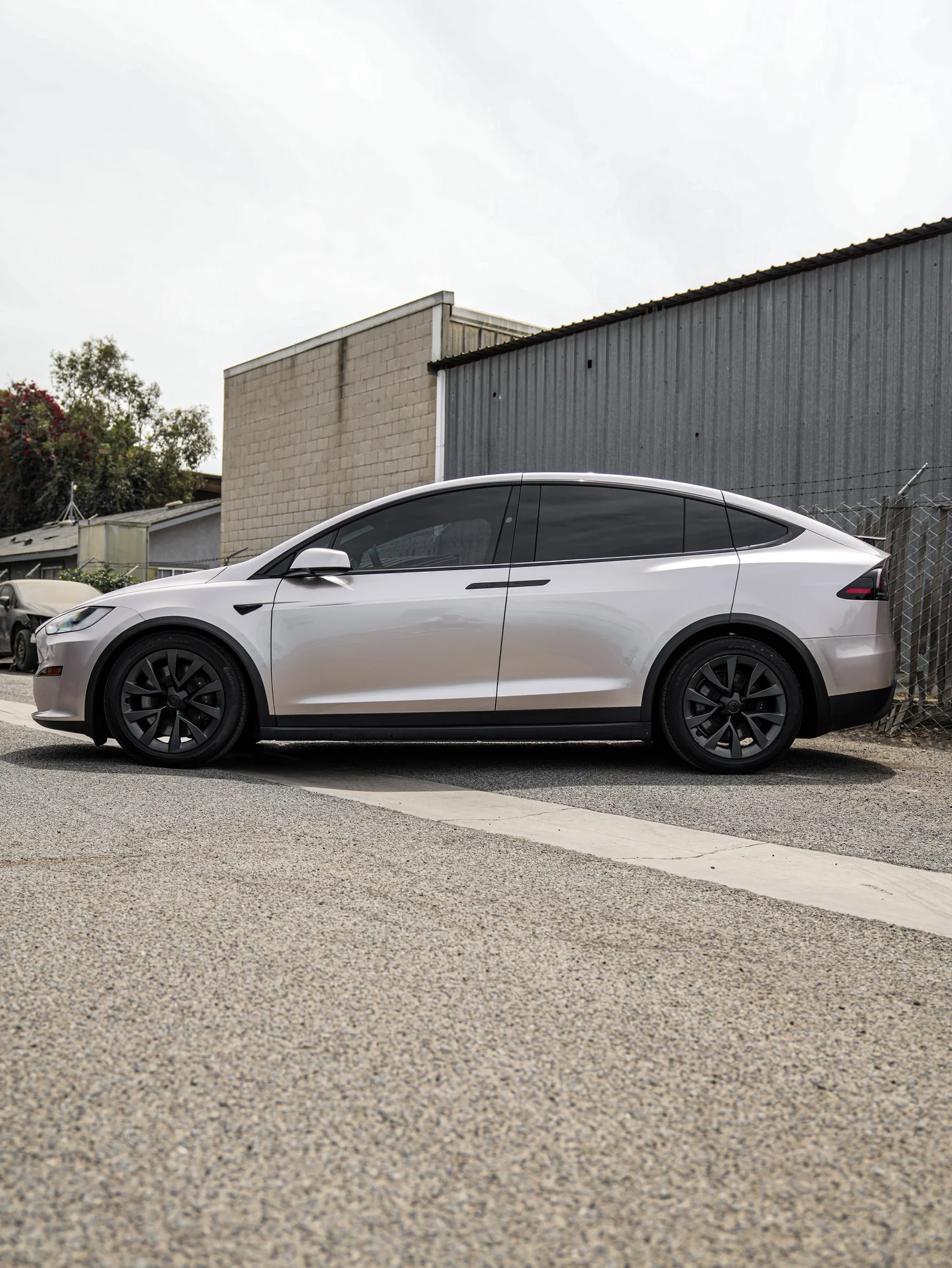 Tesla Model X Champagne Gold after Vinyl Wrap, left-side profile