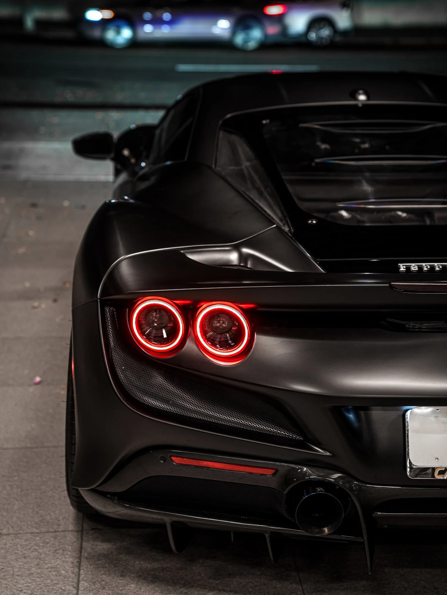 Ferrari F8 3M Satin Black after Vinyl Wrap, rear body and taillight view