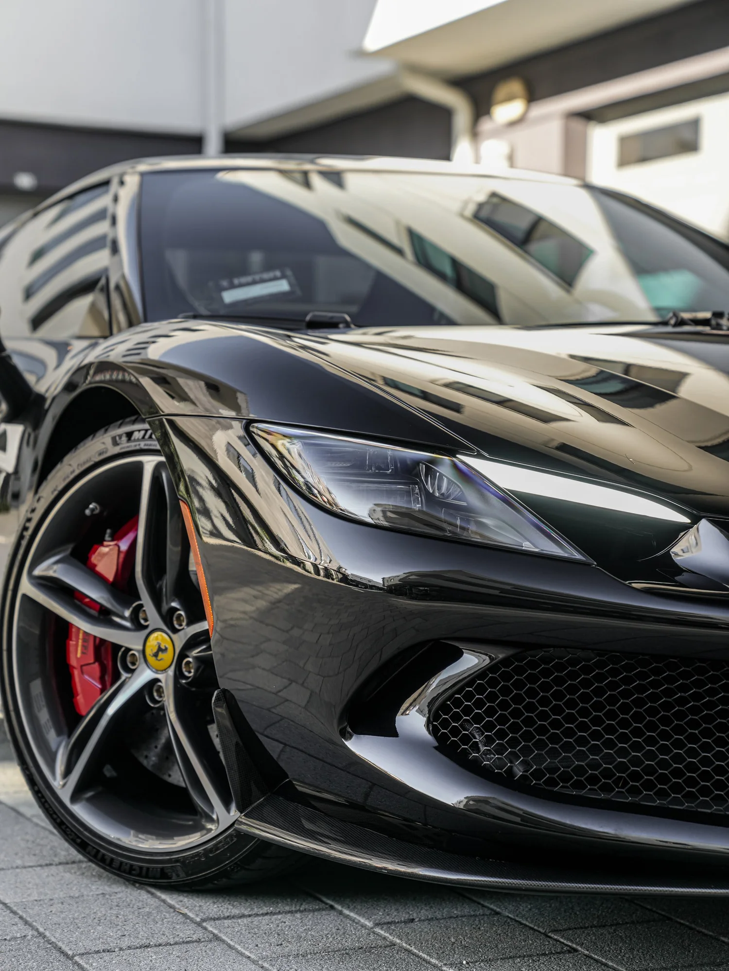 Ferrari 296 after Paint Protection Film (PPF) and Window Tint, front-corner view