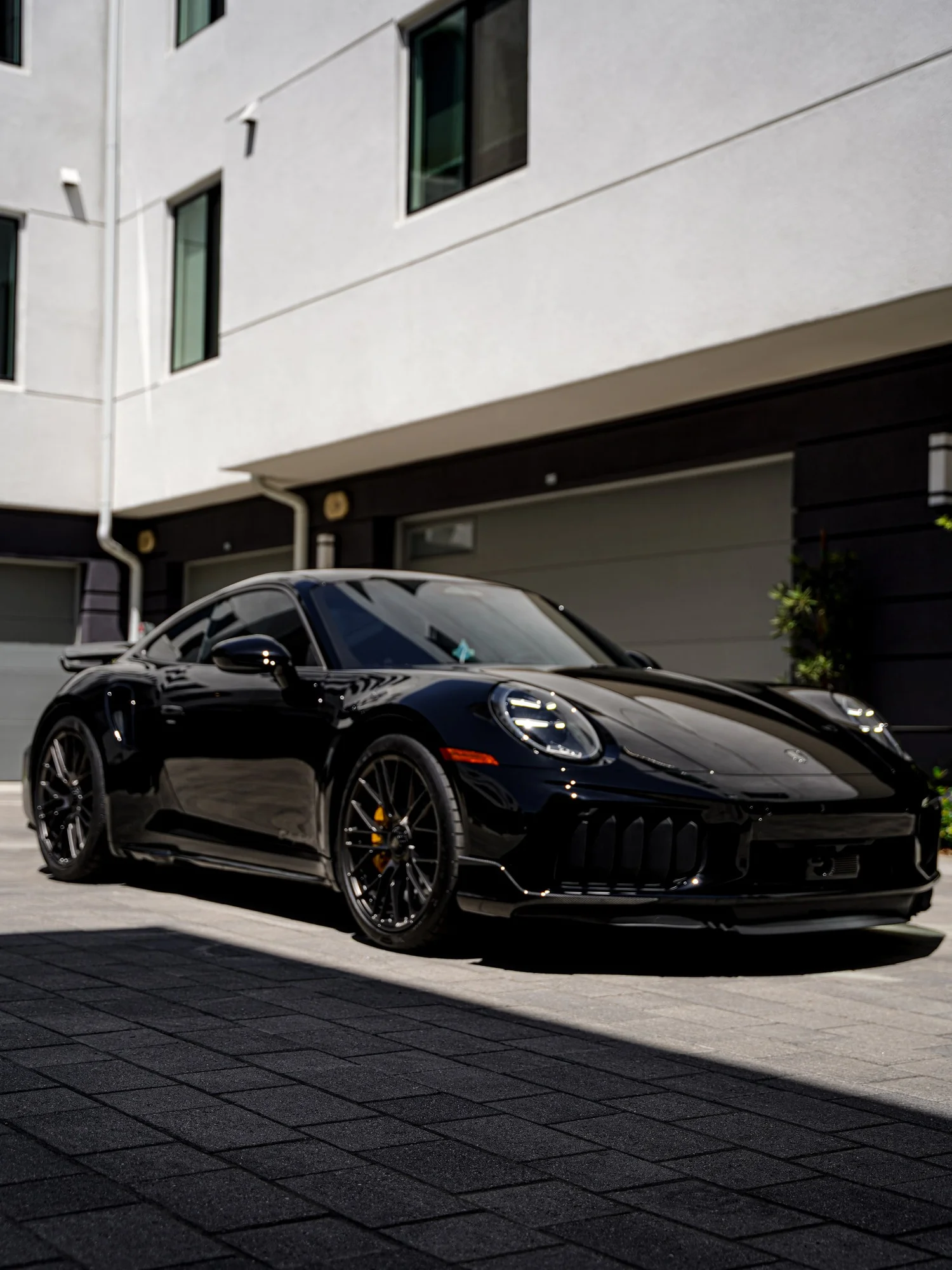 Porsche 911 Turbo S after Paint Protection Film (PPF), Window Tint and Ceramic Coating, low-angle front view
