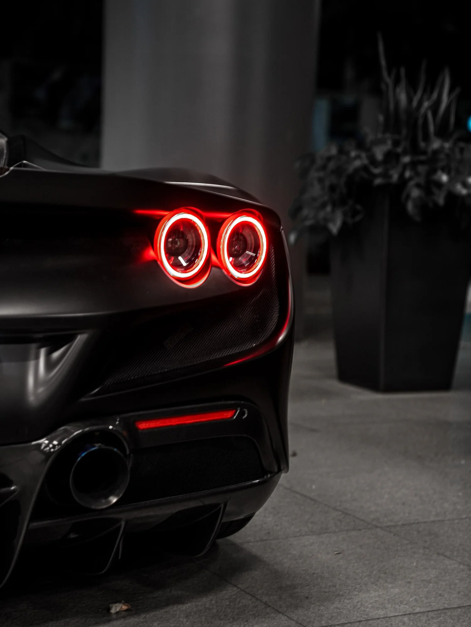 Ferrari F8 3M Satin Black after Vinyl Wrap, rear bumper and taillight detail