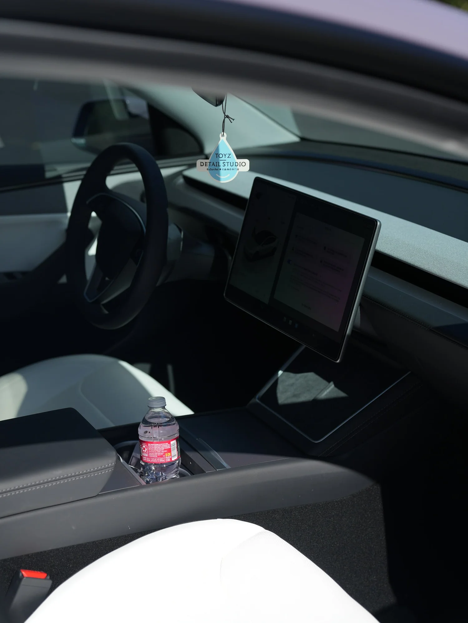 Tesla Model Y Provence Violet after Vinyl Wrap, interior cabin detail